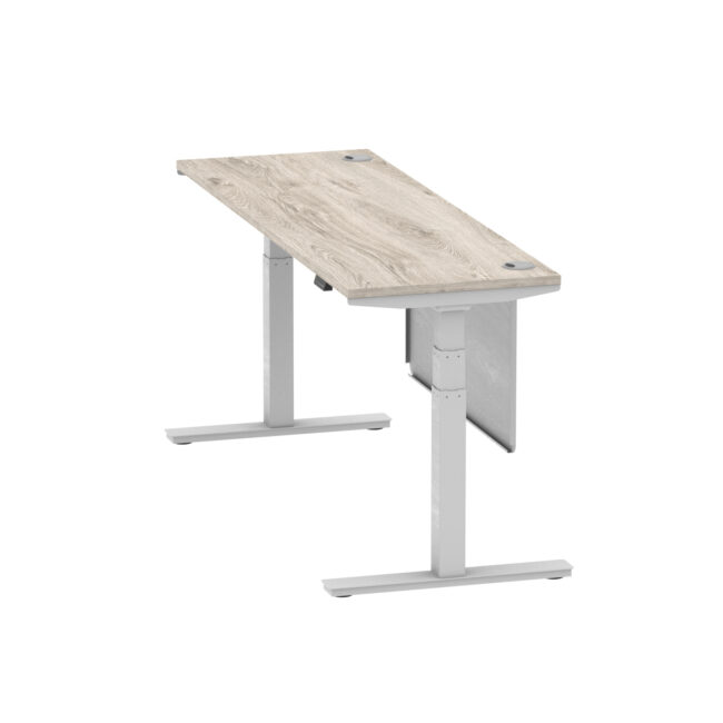 air height adjustable slimline desk with cable ports with steel modesty panel
