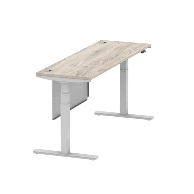 air height adjustable slimline desk with cable ports with steel modesty panel