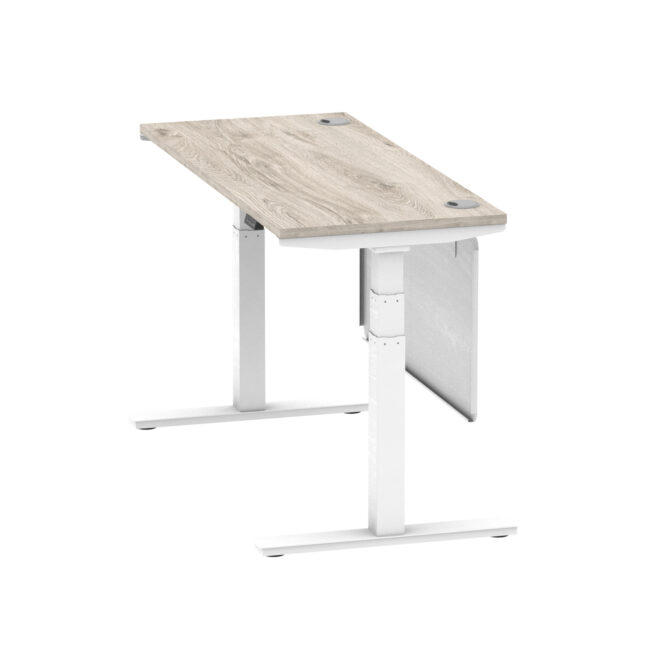 air height adjustable slimline desk with cable ports with steel modesty panel