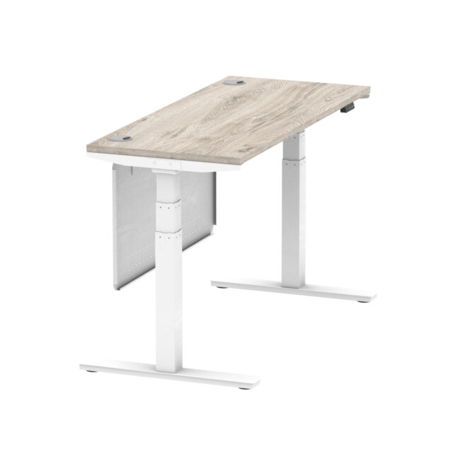 air height adjustable slimline desk with cable ports with steel modesty panel