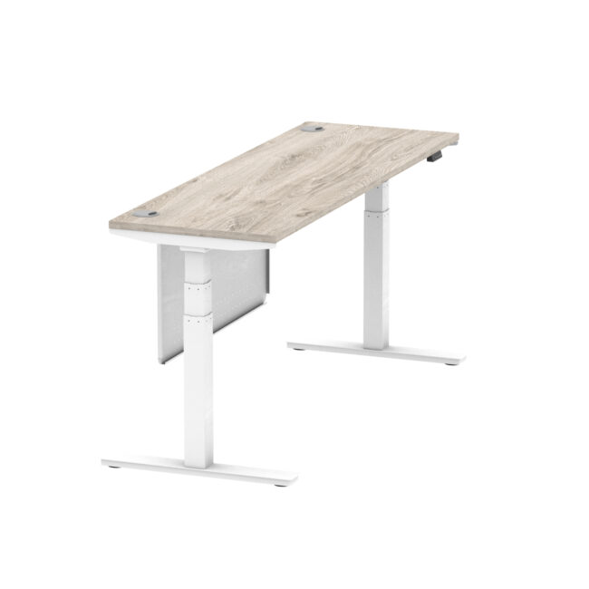 air height adjustable slimline desk with cable ports with steel modesty panel